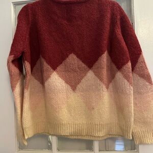 Sezane knitwear sweater in shades of pink w an argyle print in medium